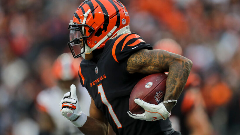 Cincinnati Bengals wide receiver Ja'Marr Chase runs with the football
