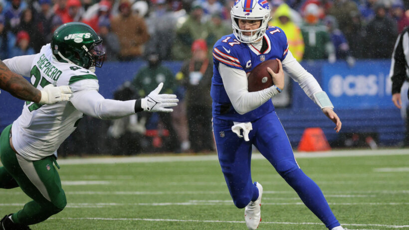 Bills quarterback Josh Allen avoids tackle