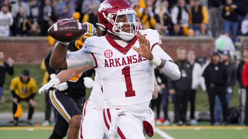 Arkansas Razorbacks quarterback KJ Jefferson throws a pass