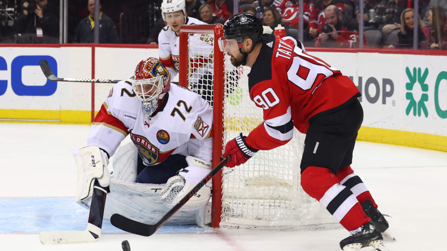 New Jersey Devils left wing Tomas Tatar plays the puck against Florida Panthers goaltender Sergei Bobrovsky