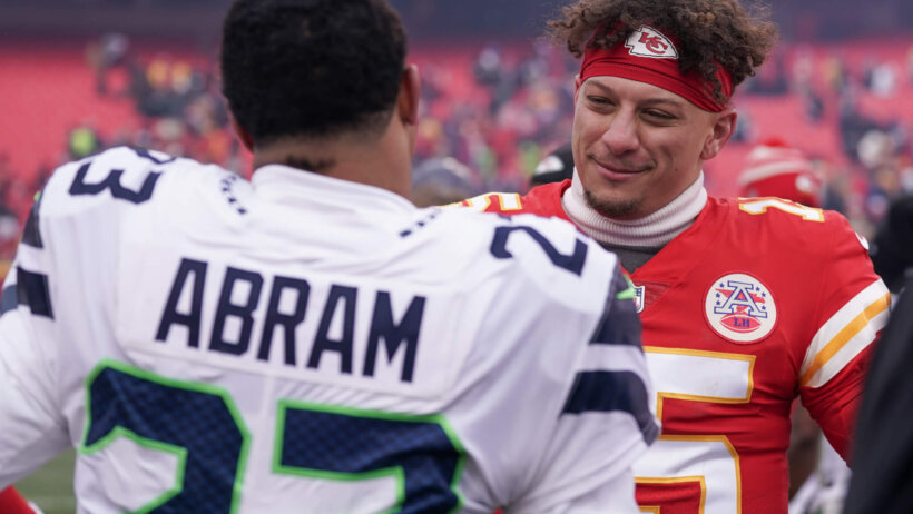 Kansas City Chiefs quarterback Patrick Mahomes talking to Seattle Seahawks safety Johnathan Abram