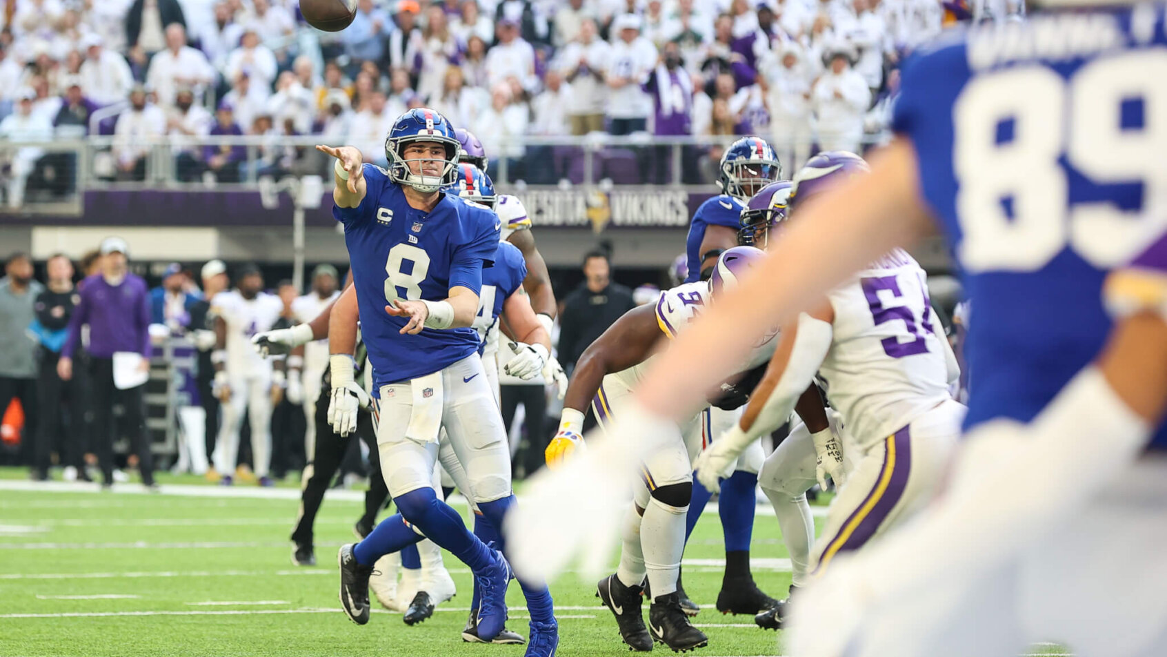 Daniel Jones throwing the football.