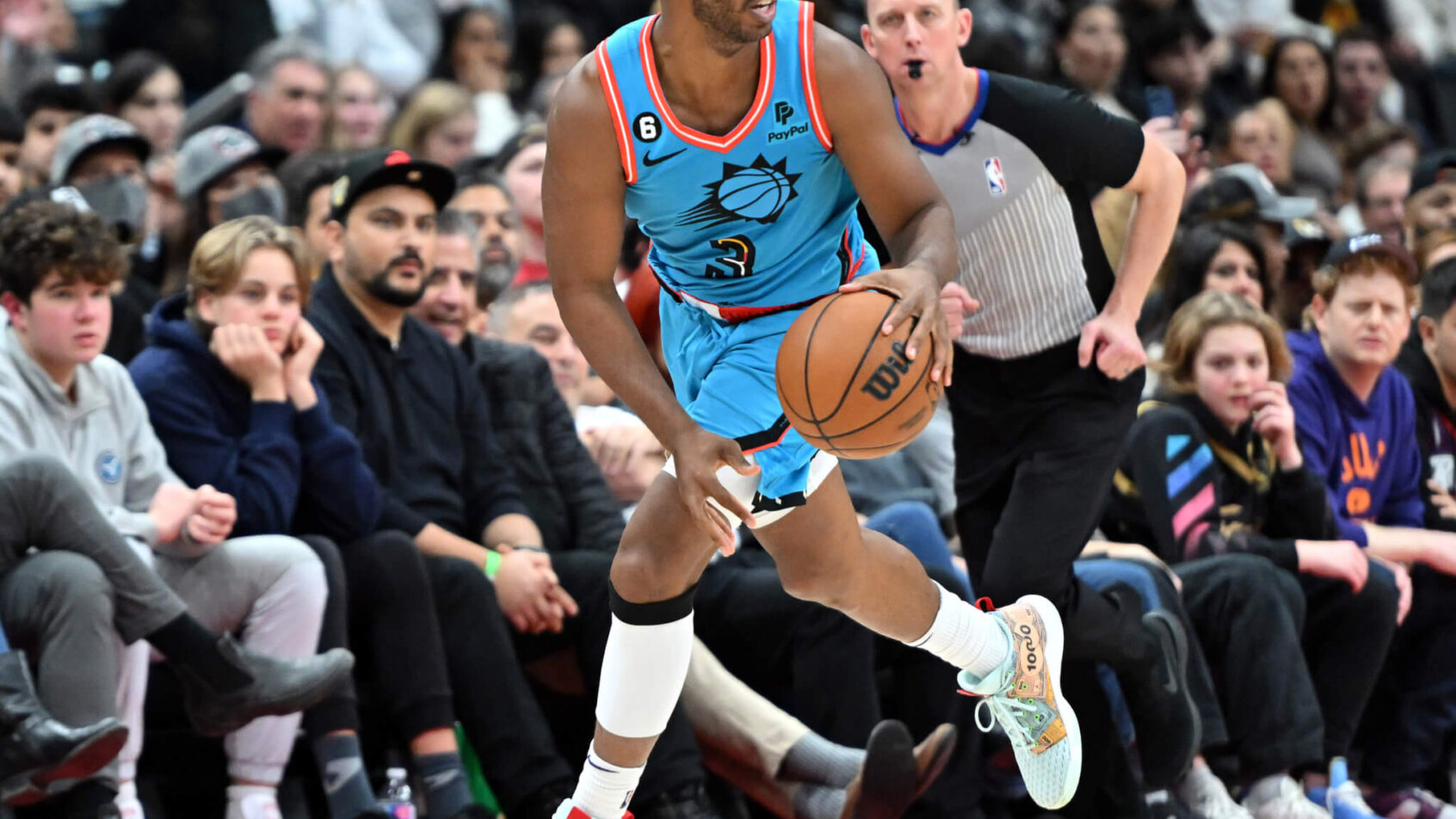 Phoenix Suns guard Chris Paul dribbling