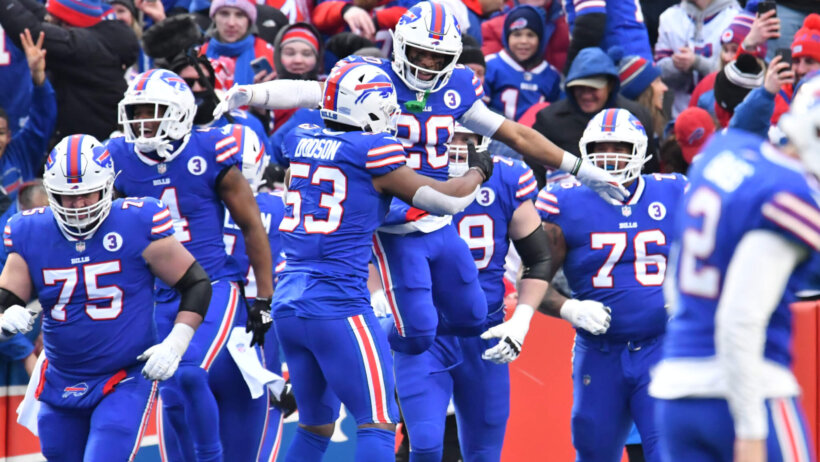 Buffalo Bills players celebrating together