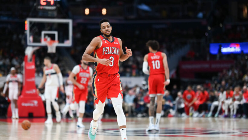 New Orleans Pelicans guard CJ McCollum runs down the court