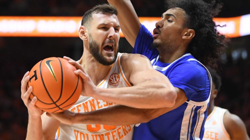 Tennessee forward Uros Plavsic drives to the hoop