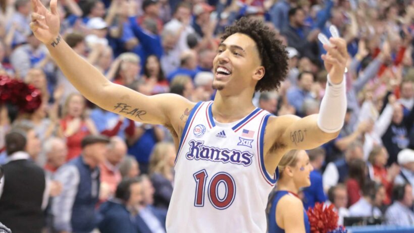 Kansas redshirt junior forward Jalen Wilson gestures to the crowd