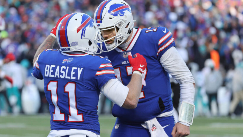Bills quarterback Josh Allen celebrates with Cole Beasley