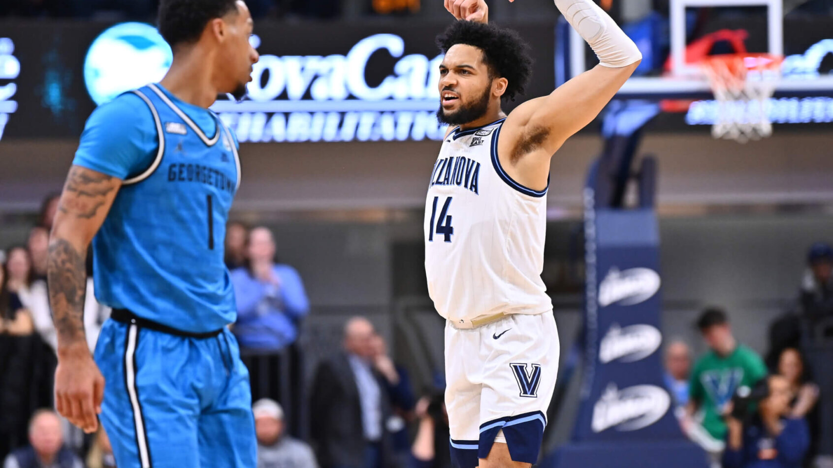 Villanova Wildcats guard Caleb Daniels flexing