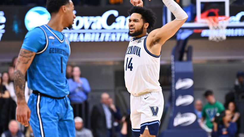 Villanova Wildcats guard Caleb Daniels flexing