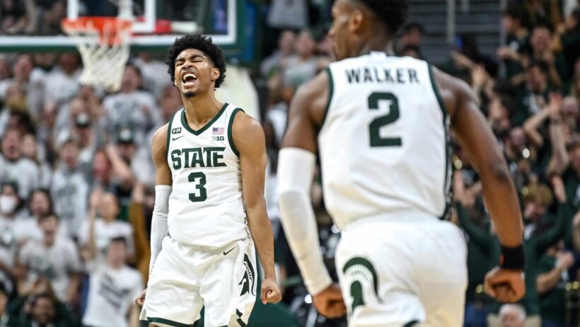 Michigan State's Jaden Akins celebrates an assist
