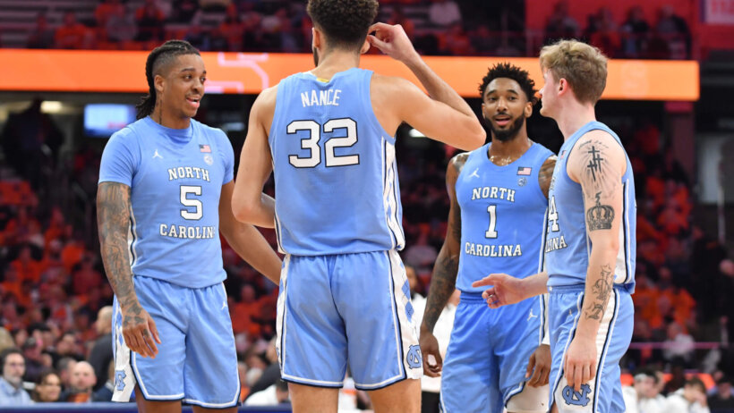 North Carolina Tar Heels players talking on the court