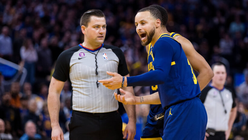 Steph Curry talking to an official