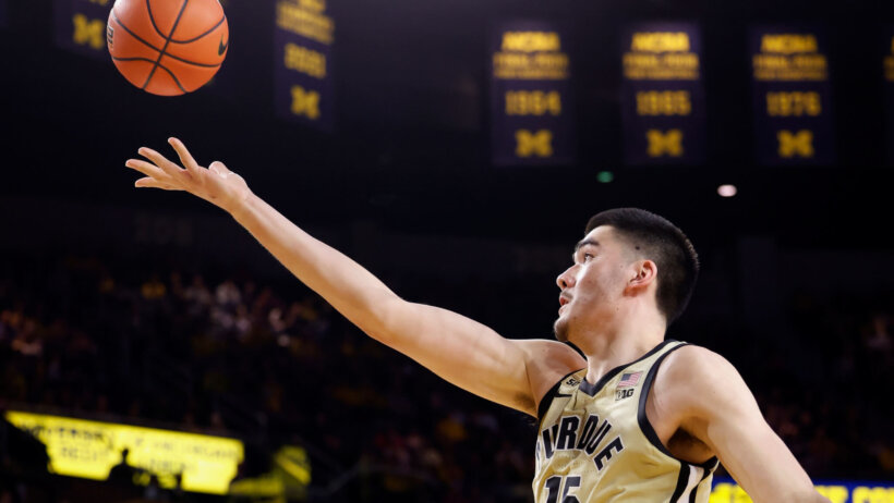 Purdue Boilermakers center Zach Edey lays a ball into the hoop