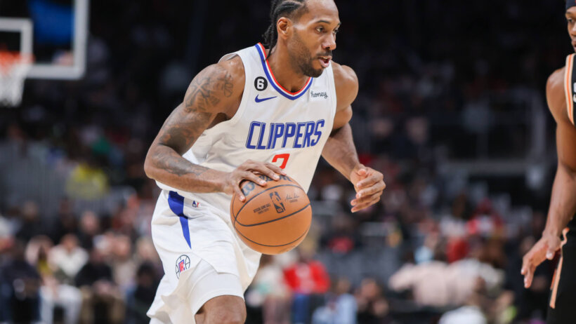 LA Clippers forward Kawhi Leonard dribbles up the floor