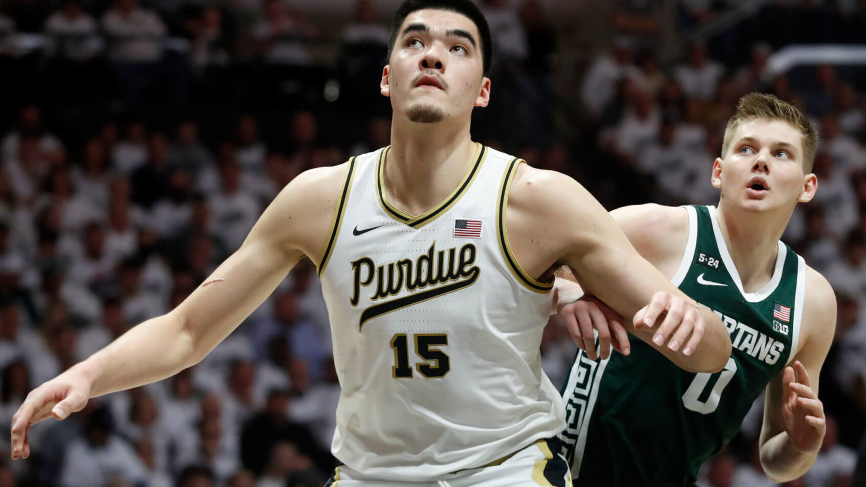 Purdue Boilermakers center Zach Edey boxing out an opponent