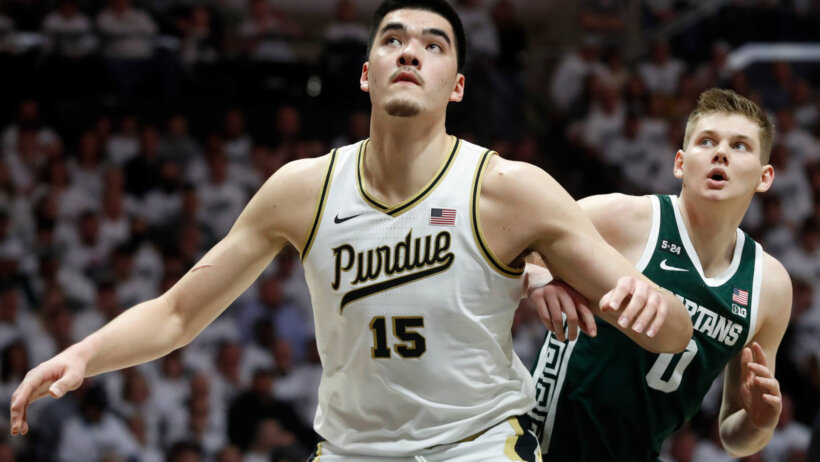 Purdue Boilermakers center Zach Edey boxing out an opponent