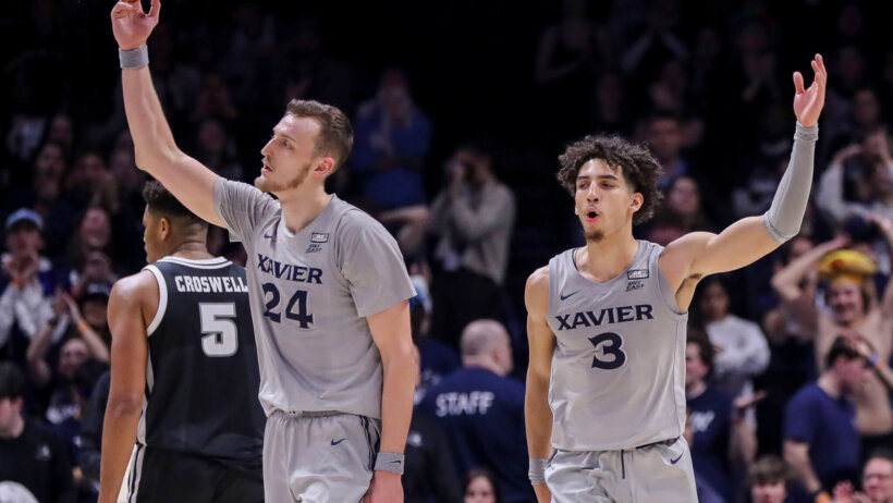 Xavier Musketeers forward Jack Nunge and guard Colby Jones wave to the crowd