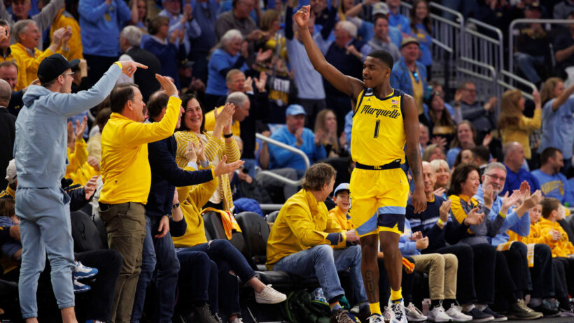 Marquette Golden Eagles guard Kam Jones celebrating