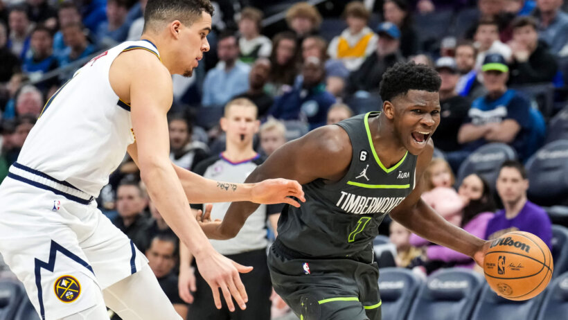 Minnesota Timberwolves guard Anthony Edwards drives past a defender