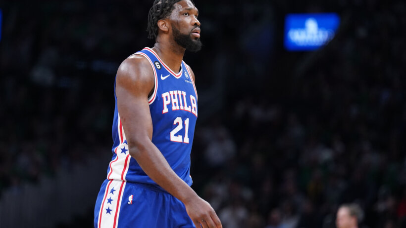 Philadelphia 76ers center Joel Embiid walks down the court