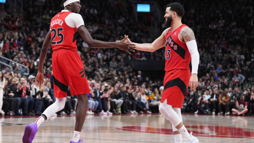 Fred VanVleet and Chris Boucher high-five