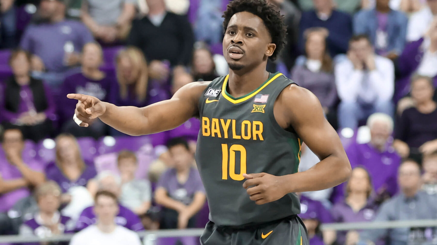 Baylor Bears guard Adam Flagler pointing
