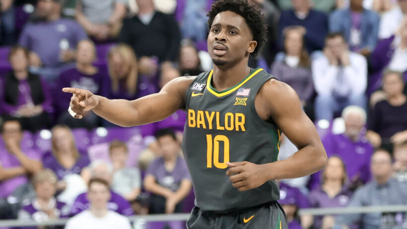 Baylor Bears guard Adam Flagler pointing