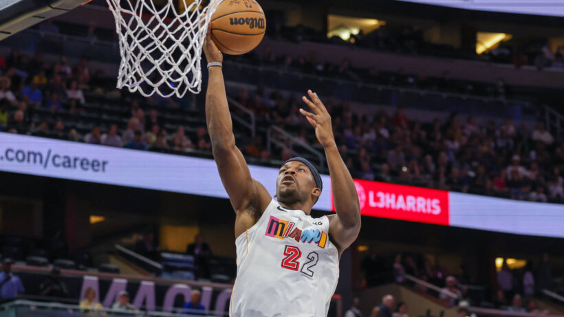 Miami Heat forward Jimmy Butler doing a layup