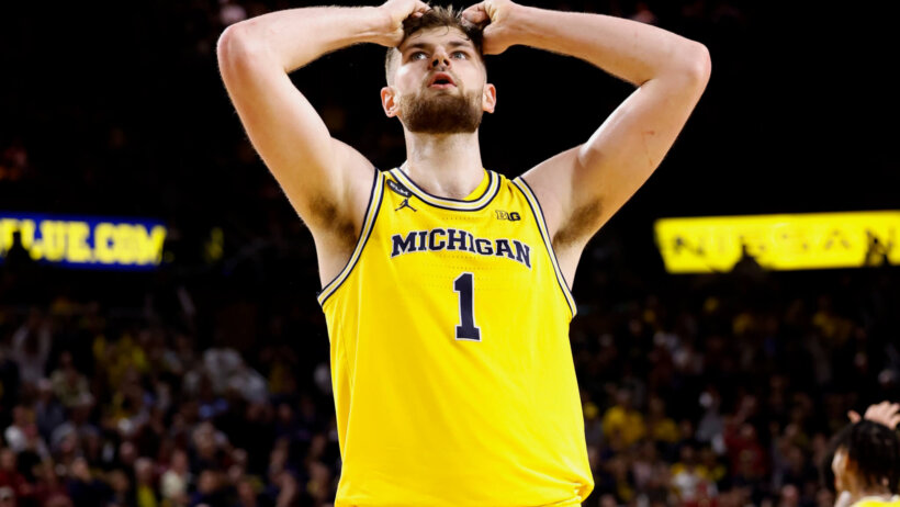 Hunter Dickinson hands on head in disbelief