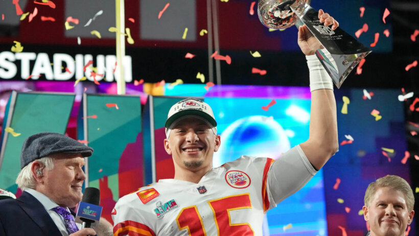 Patrick Mahomes raises the Lombardi Trophy