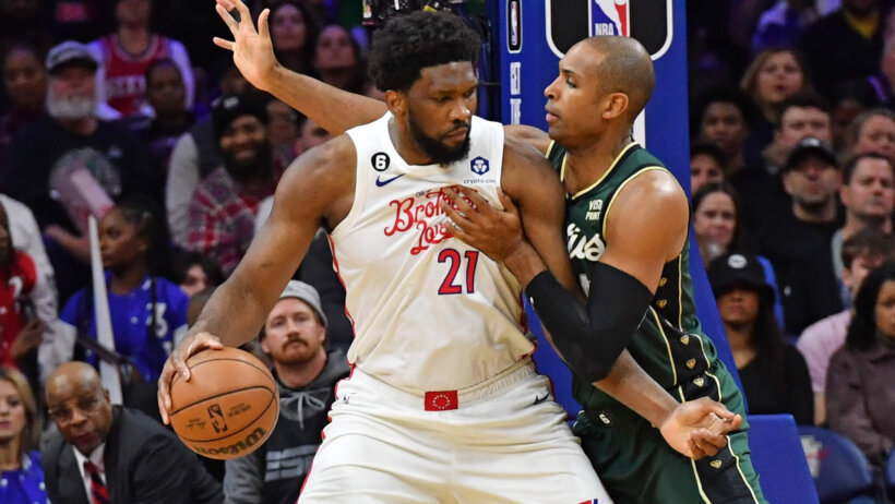 Philadelphia 76ers center Joel Embiid backs down a defender