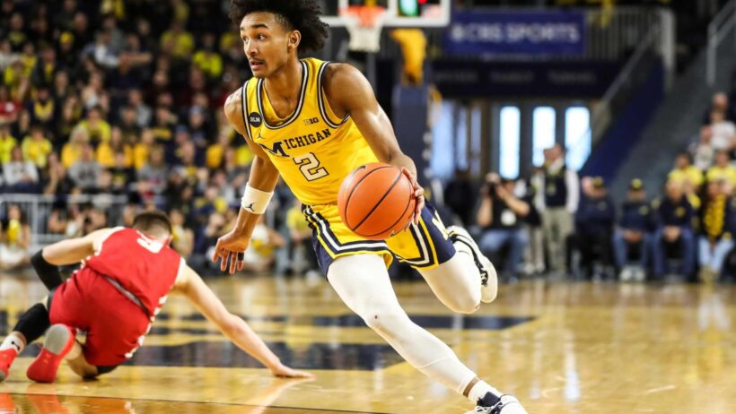 Michigan guard Kobe Bufkin drives to the hoop