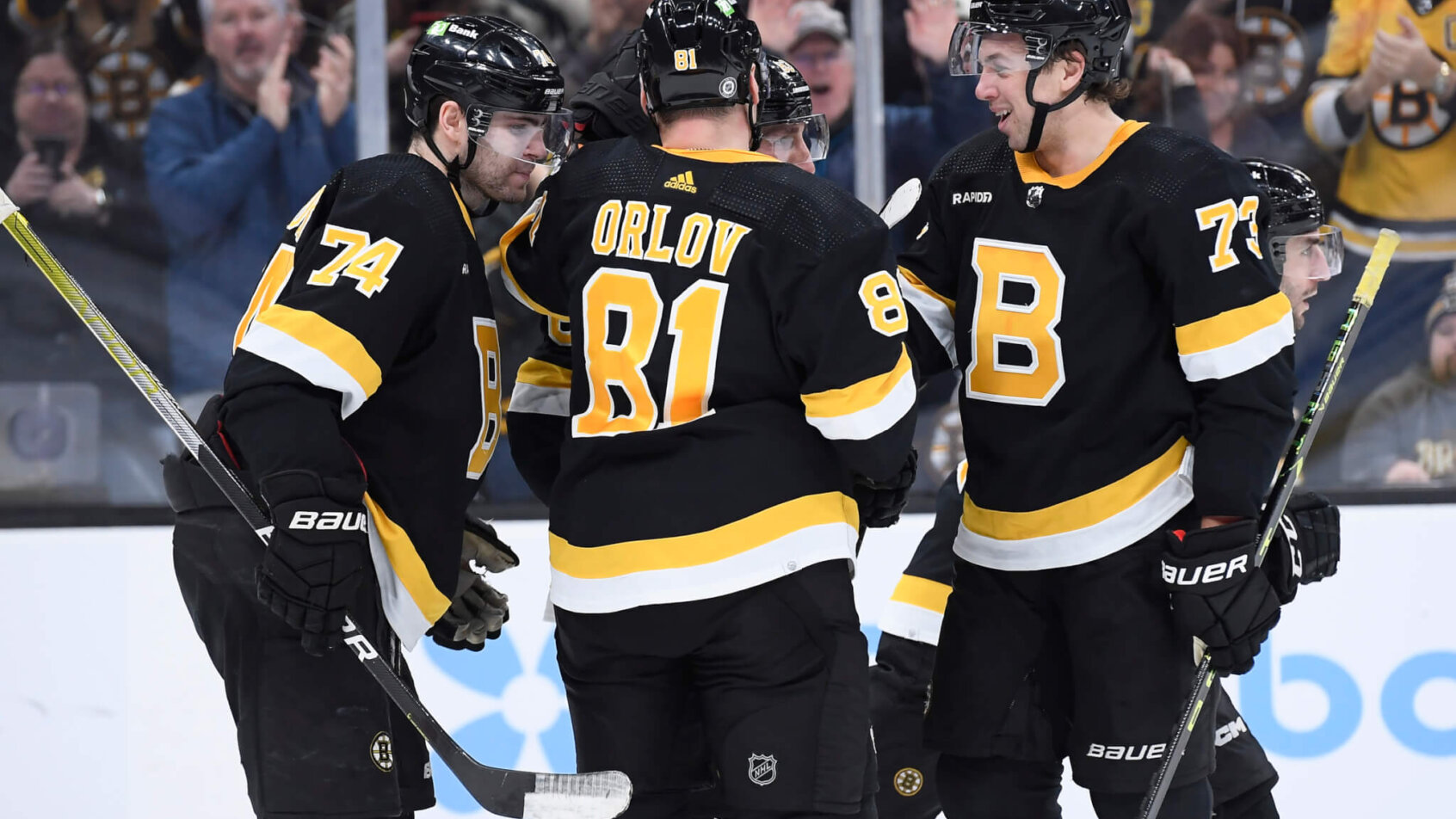 Boston Bruins players celebrating.