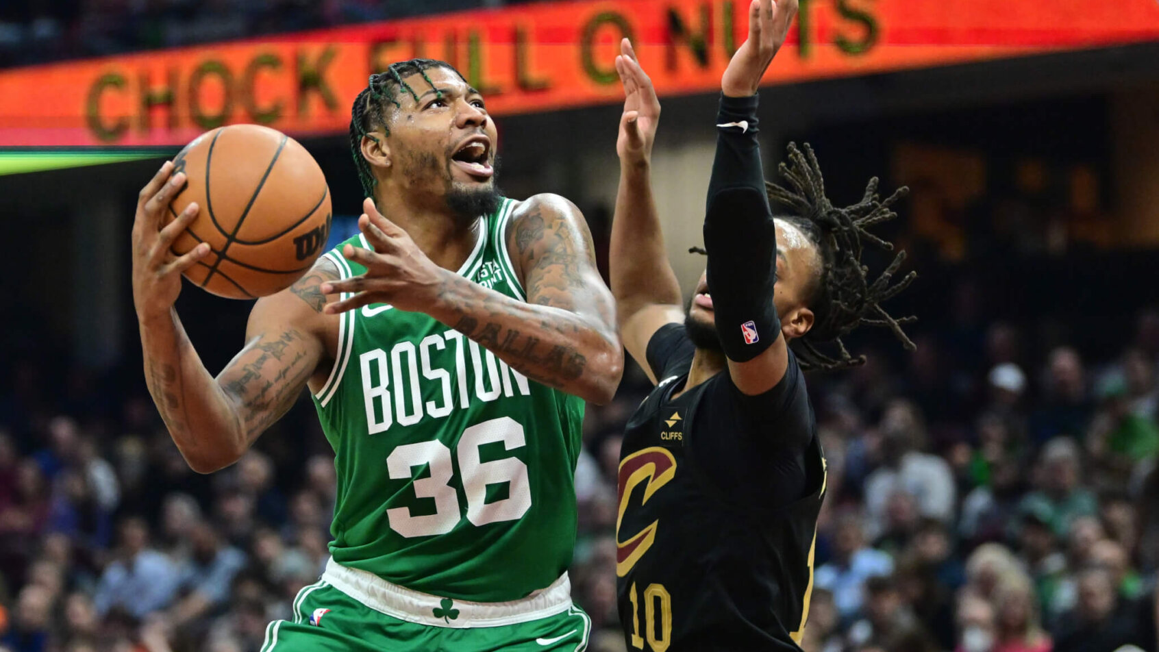 Boston Celtics guard Marcus Smart attacks the rim.