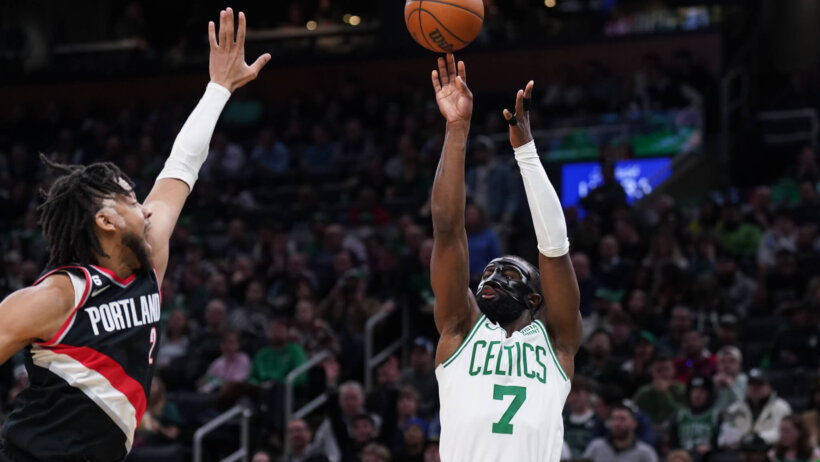 Boston Celtics guard Jaylen Brown rises up for a jumper.