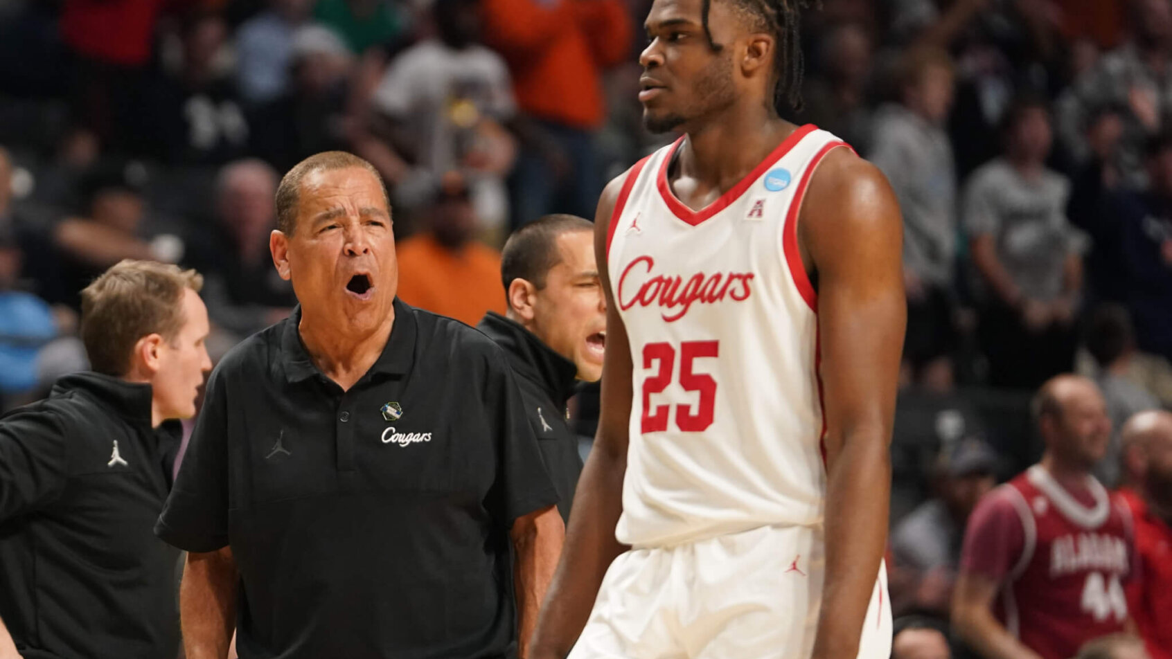 Houston Cougars head coach Kelvin Sampson talks with forward Jarace Walker