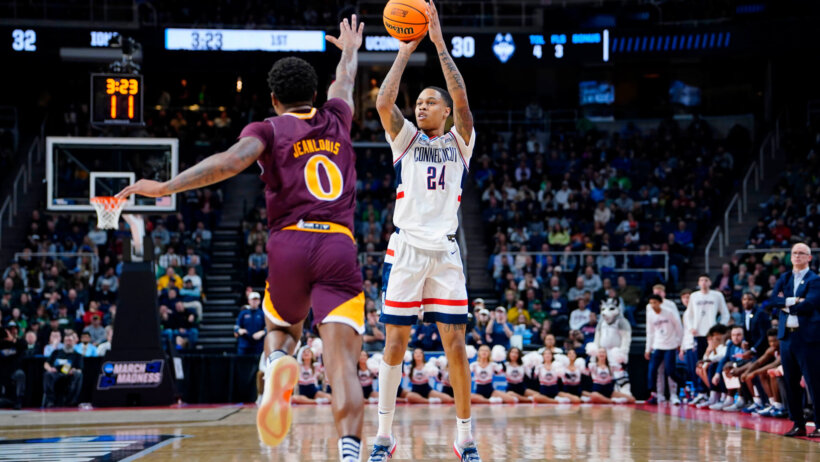 UConn Huskies guard Jordan Hawkins shooting a three