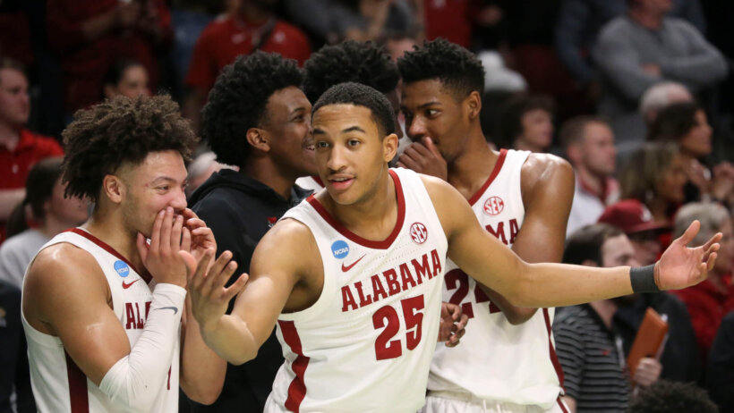 Alabama players celebrate their March Madness win over Maryland