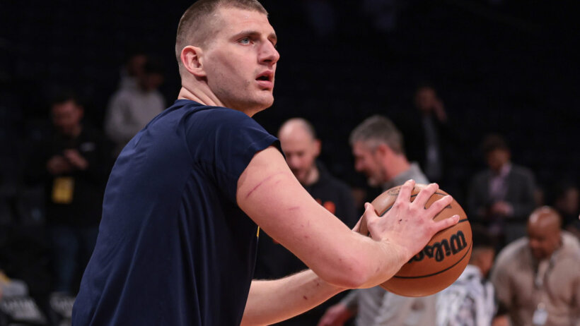 Nikola Jokic warming up