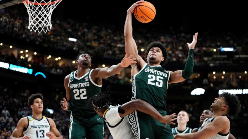 Michigan State Spartans forward Malik Hall (25) grabs a rebound