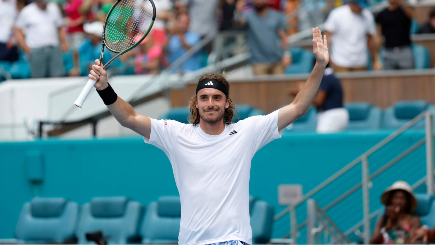 Stefanos Tsitsipas celebrating after a win.