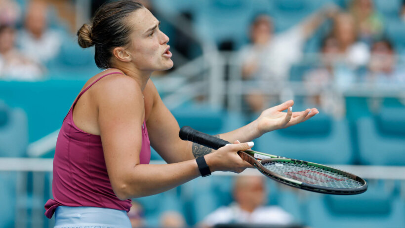 Aryna Sabalenka reacts after losing a point