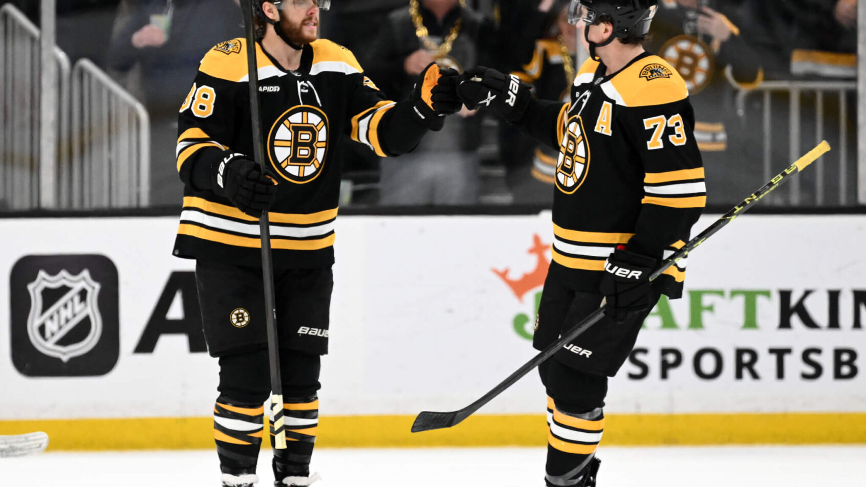 Boston Bruins right wing David Pastrnak celebrates goal with defenseman Charlie McAvoy