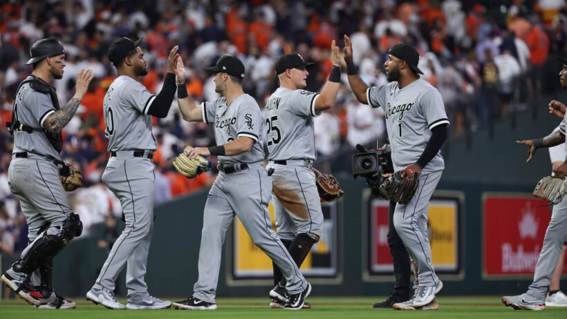 Chicago White Sox players celebrate a win over Houston