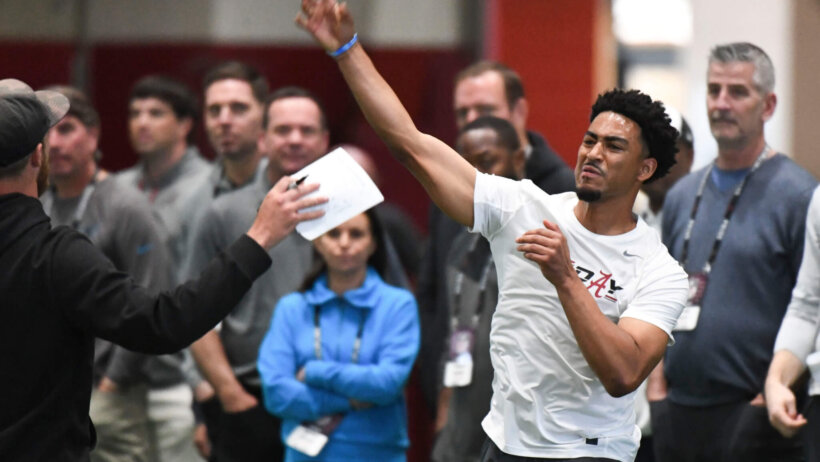 Bryce Young throws during Alabama's pro day.