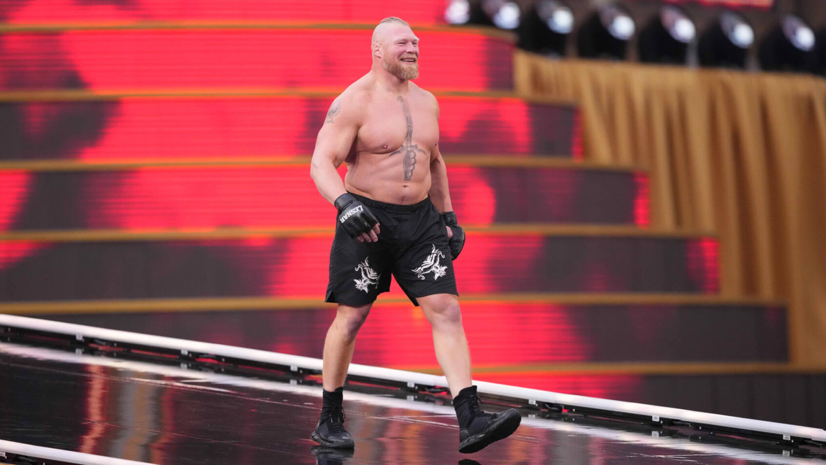 Brock Lesnar walks on the stage during WWE