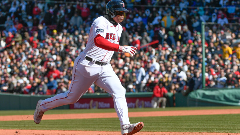 Boston Red Sox third baseman Rafael Devers circles the bases