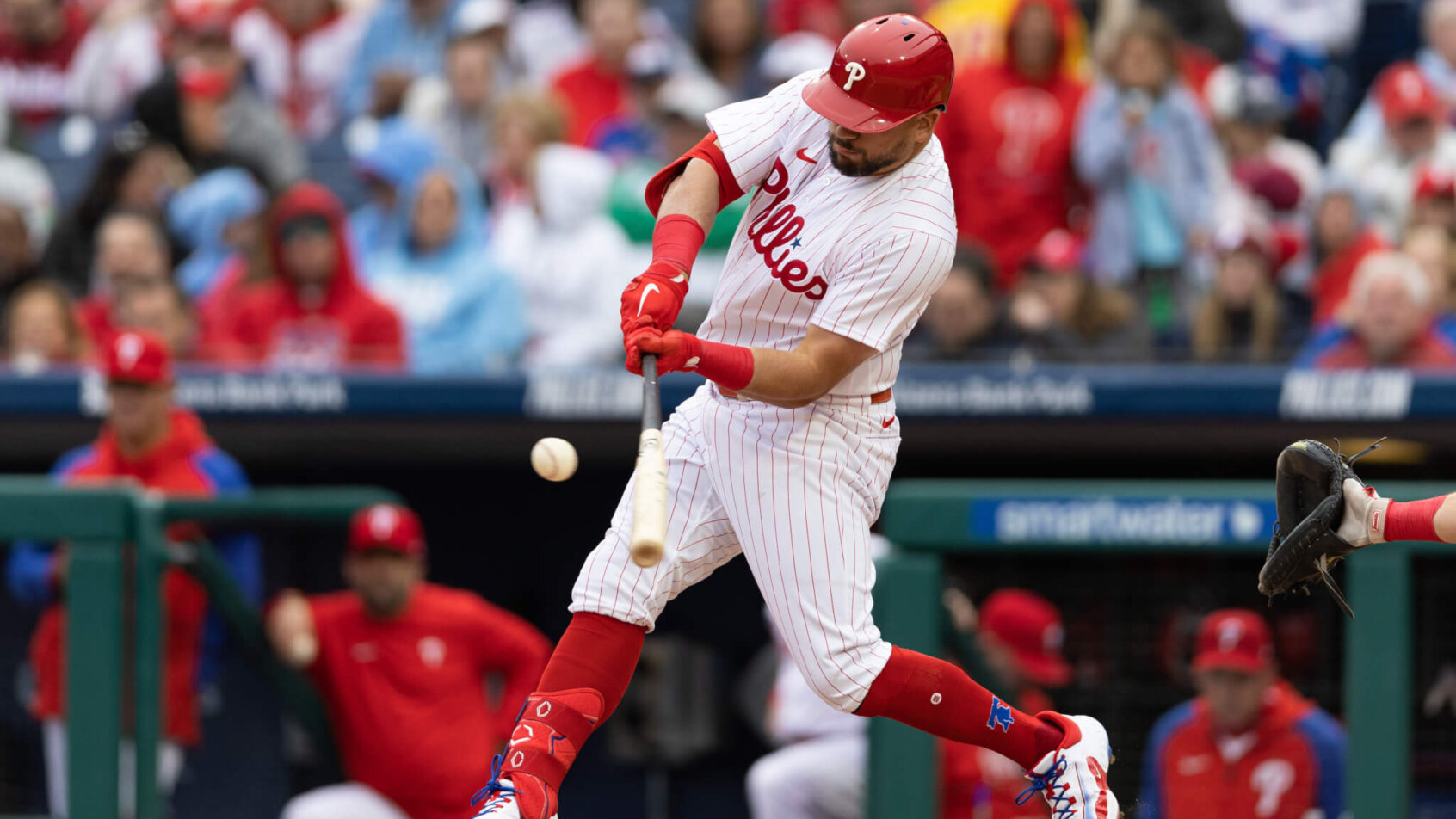 Kyle Schwarber swings; Philadelphia Phillies