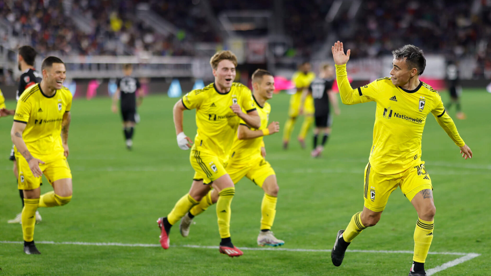 Columbus Crew midfielder Lucas Zelarayan (10) celebrates with teammates